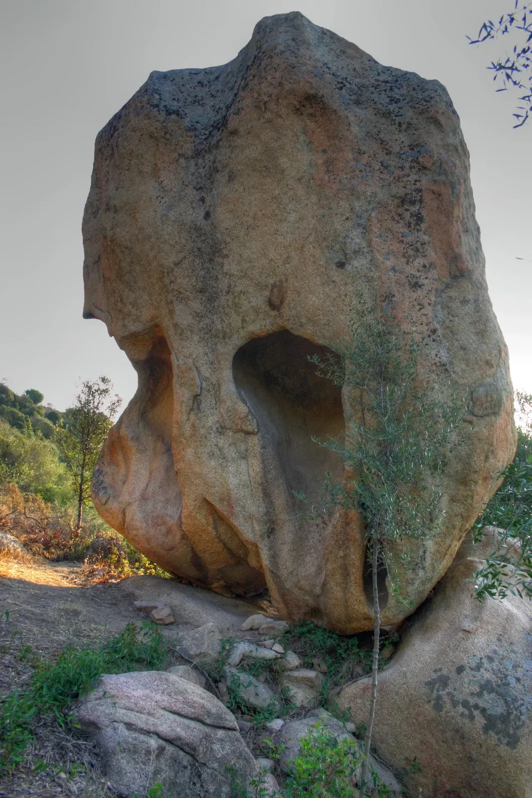 The skull-shaped rock formation of La Tete de Mort above the water near Ajaccio, Corsica