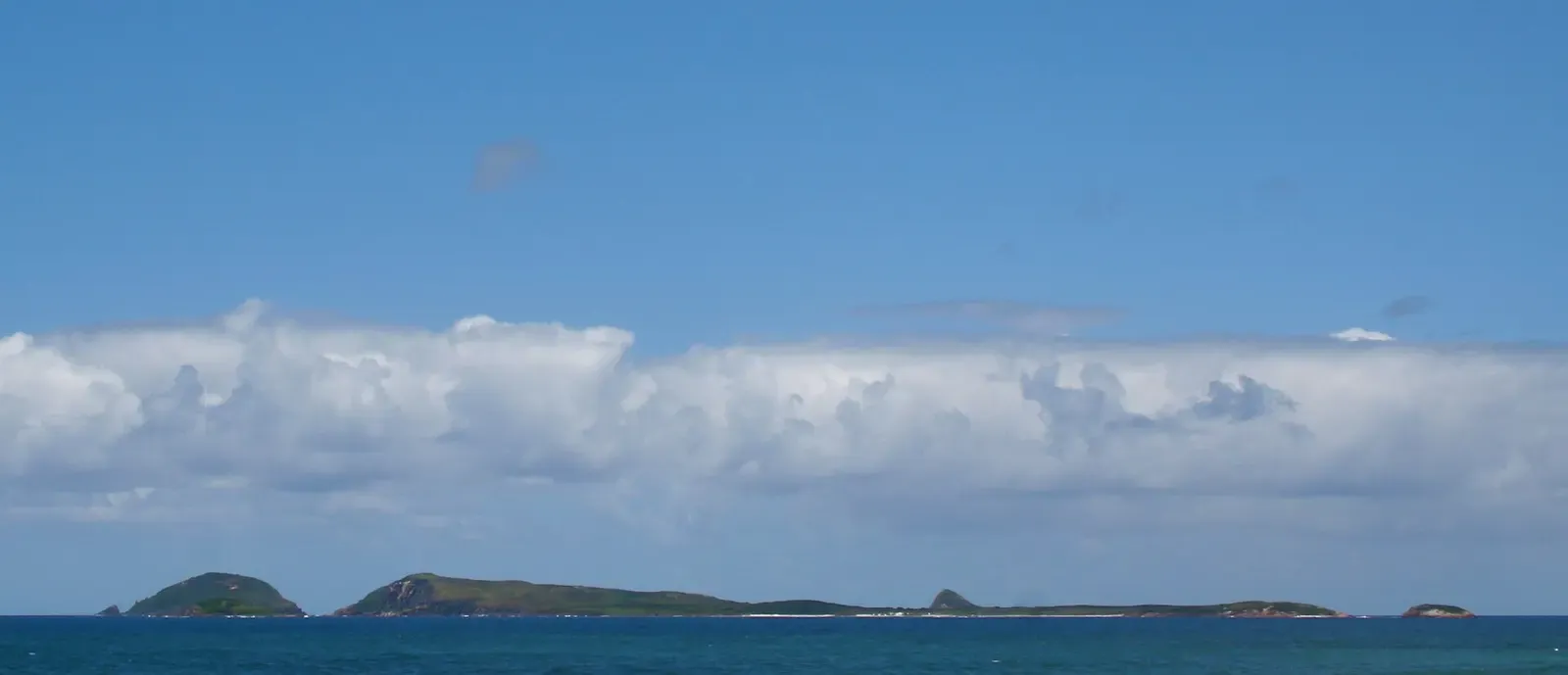Broughton Island viewed across the water from the mainland coast — Nelson Bay
