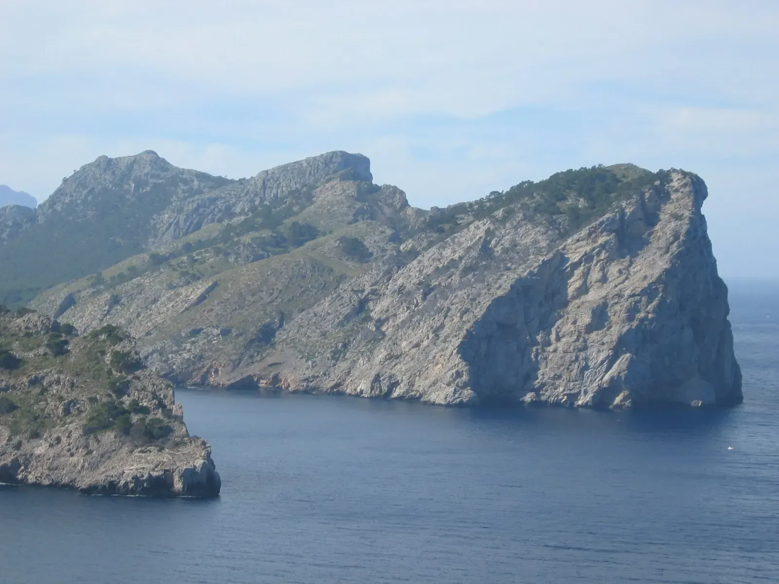 Cap de Catalunya's ridgeline seen across the water from neighbouring Cap de Formentor