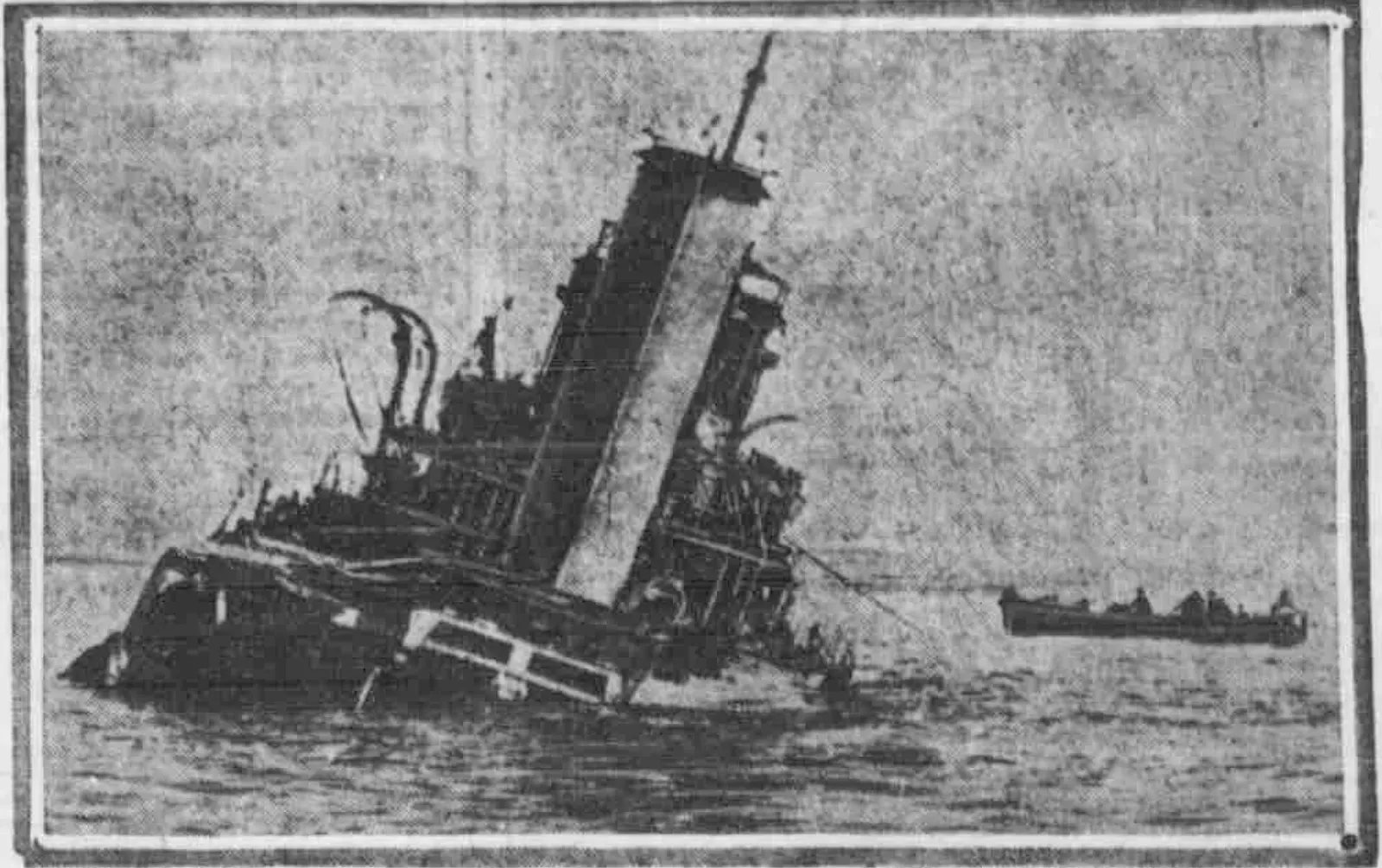 A grainy 1915 newspaper photograph of the destroyer HMS Louis stranded and listing in Suvla Bay — Gallipoli.