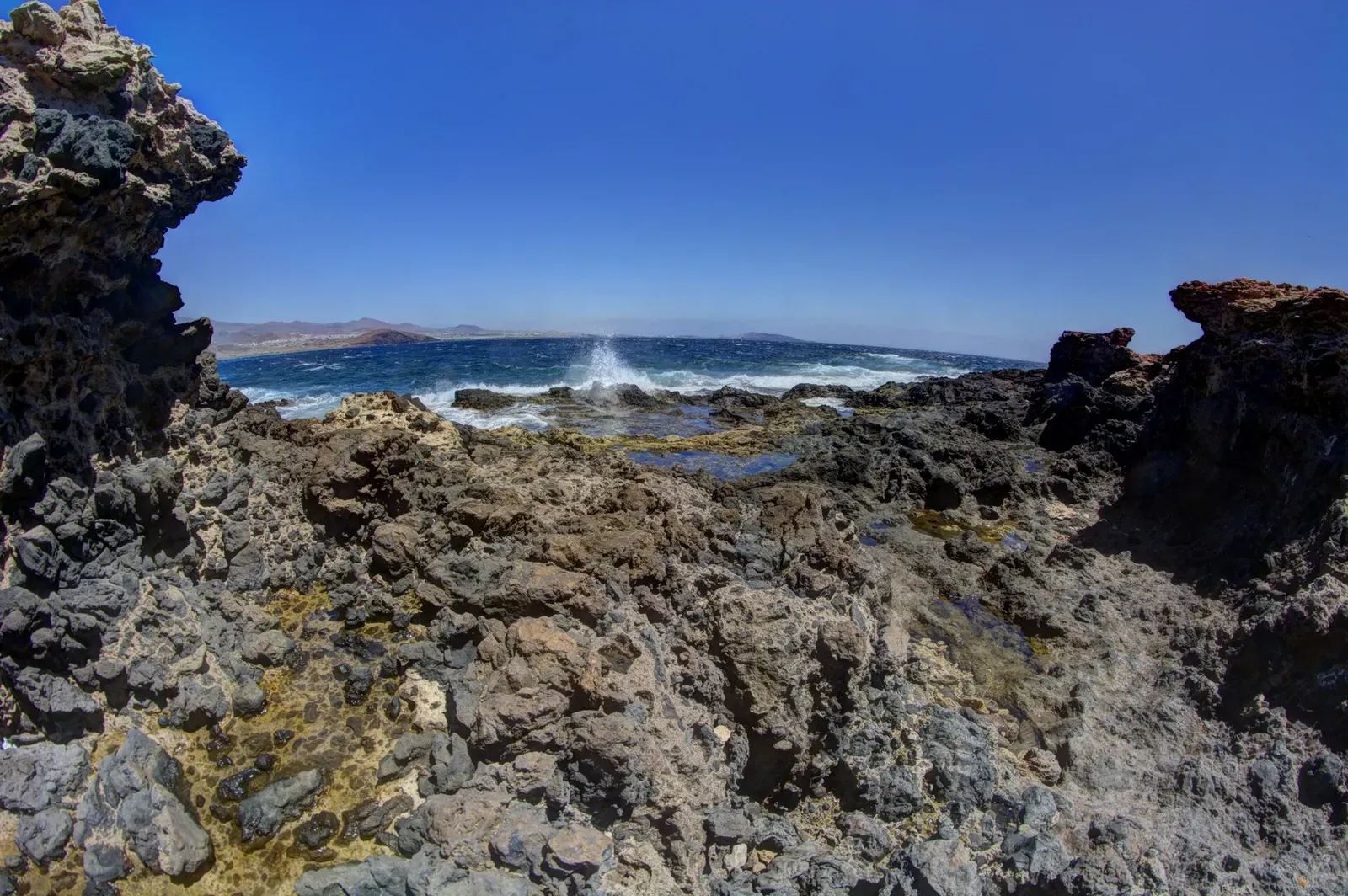 Playa del Cabron beach and salt flats along the coast beside Punta de la Sal, Gran Canaria