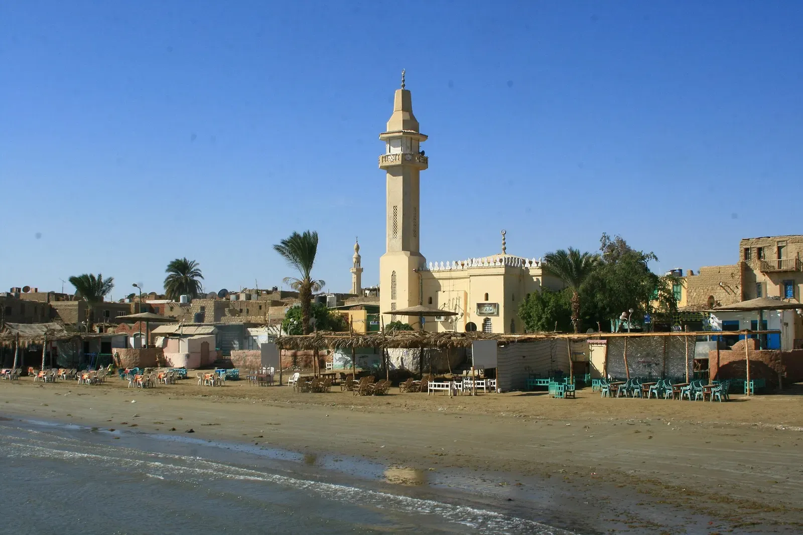 El Quseir's minaret and waterfront buildings seen from the beach