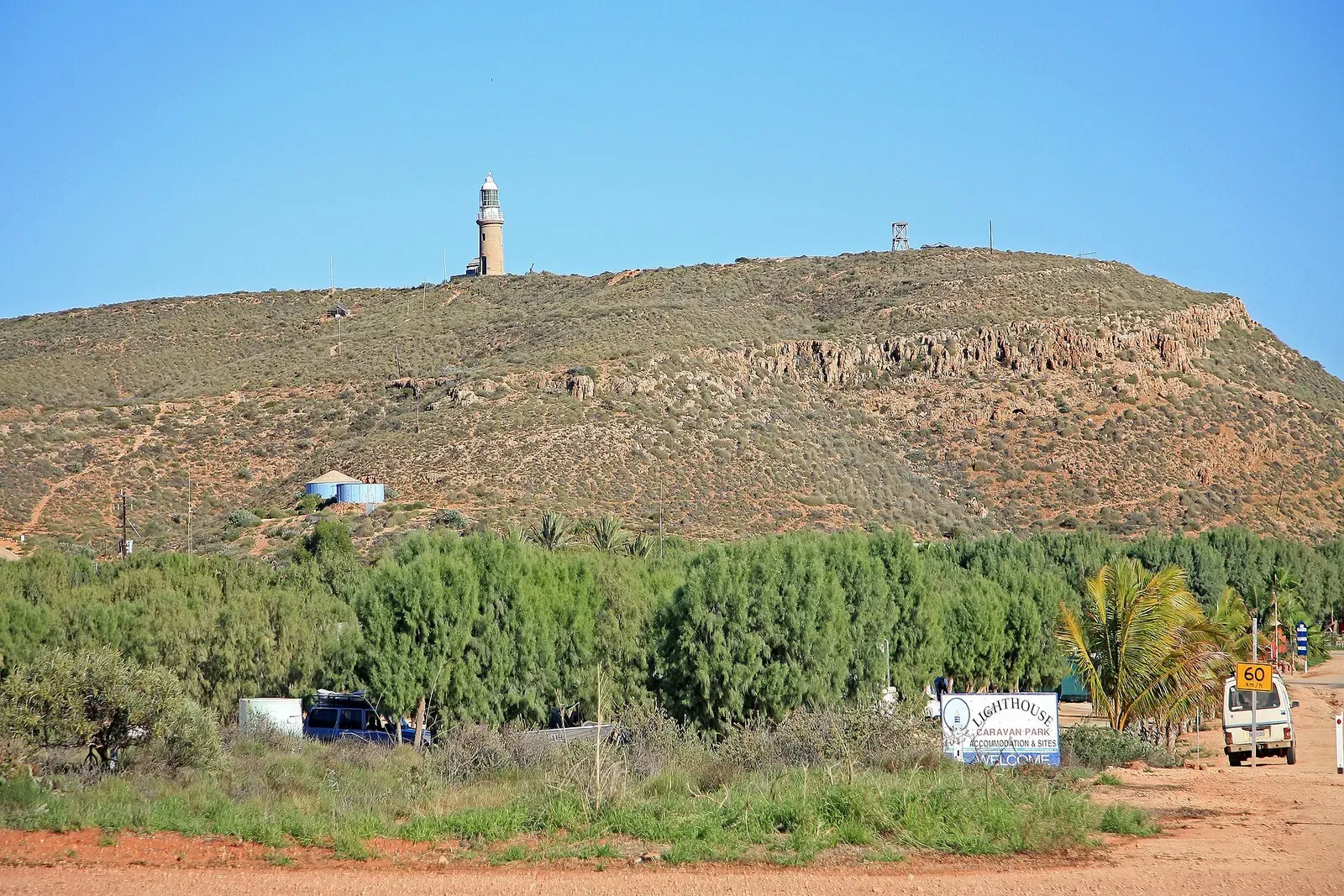 Vlamingh Head Lighthouse overlooking scrubland on North West Cape near Exmouth, Western Australia — Exmouth Navy Pier
