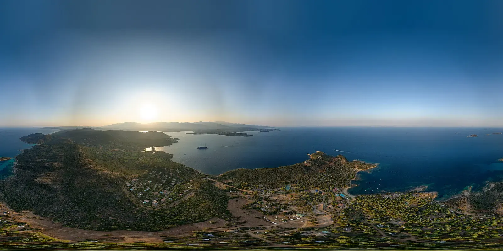 Wide aerial panorama of the Chiappa peninsula and its coastline near Porto-Vecchio at low sun — La Pointe de la Chiappa, Bonifacio, Corsica