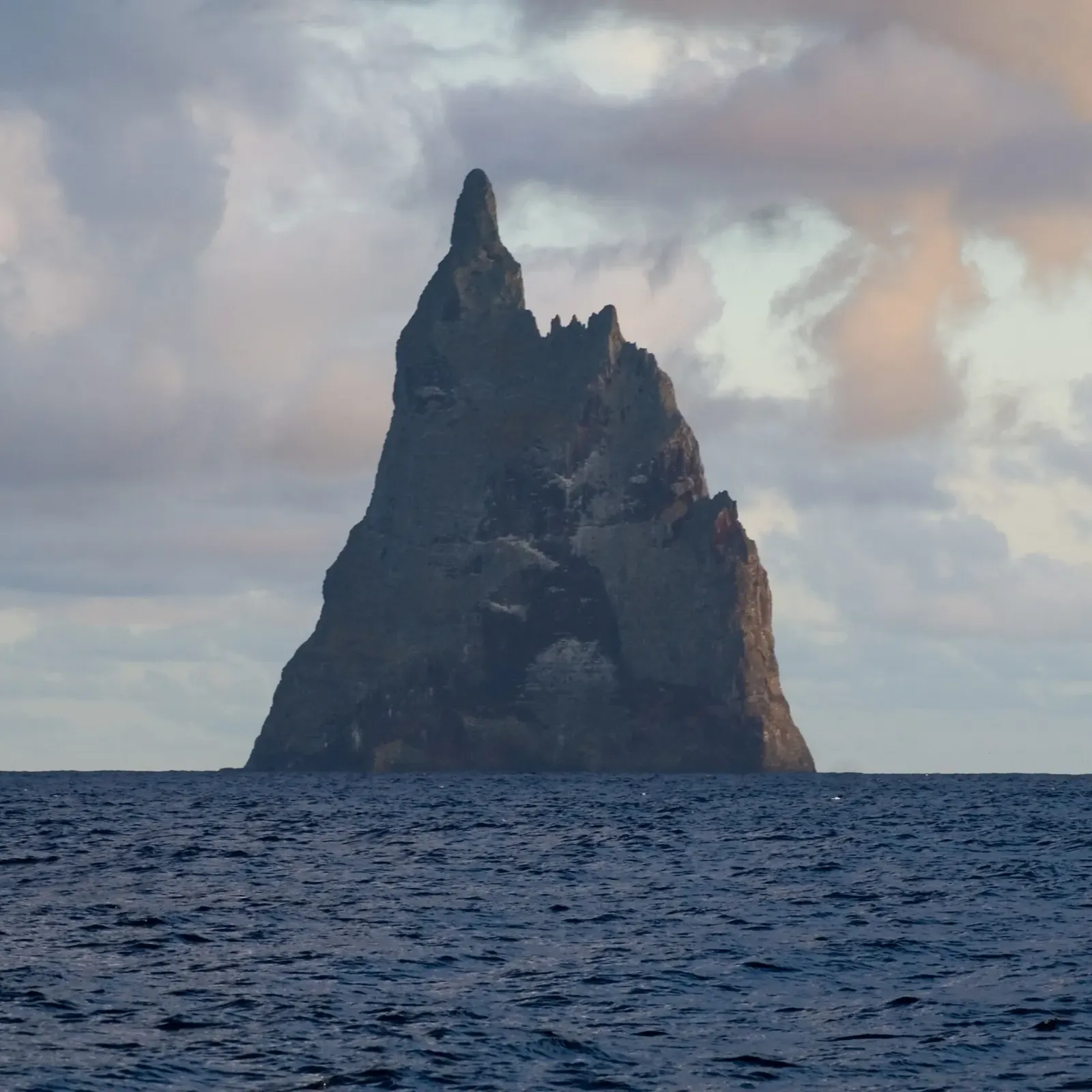 Ball's Pyramid's jagged summit ridge in warm afternoon light — Balls Pyramid, Lord Howe Island