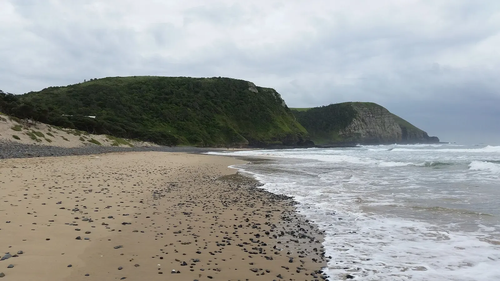 Beach and green headland at Coffee Bay, Eastern Cape, South Africa — Sardine Run