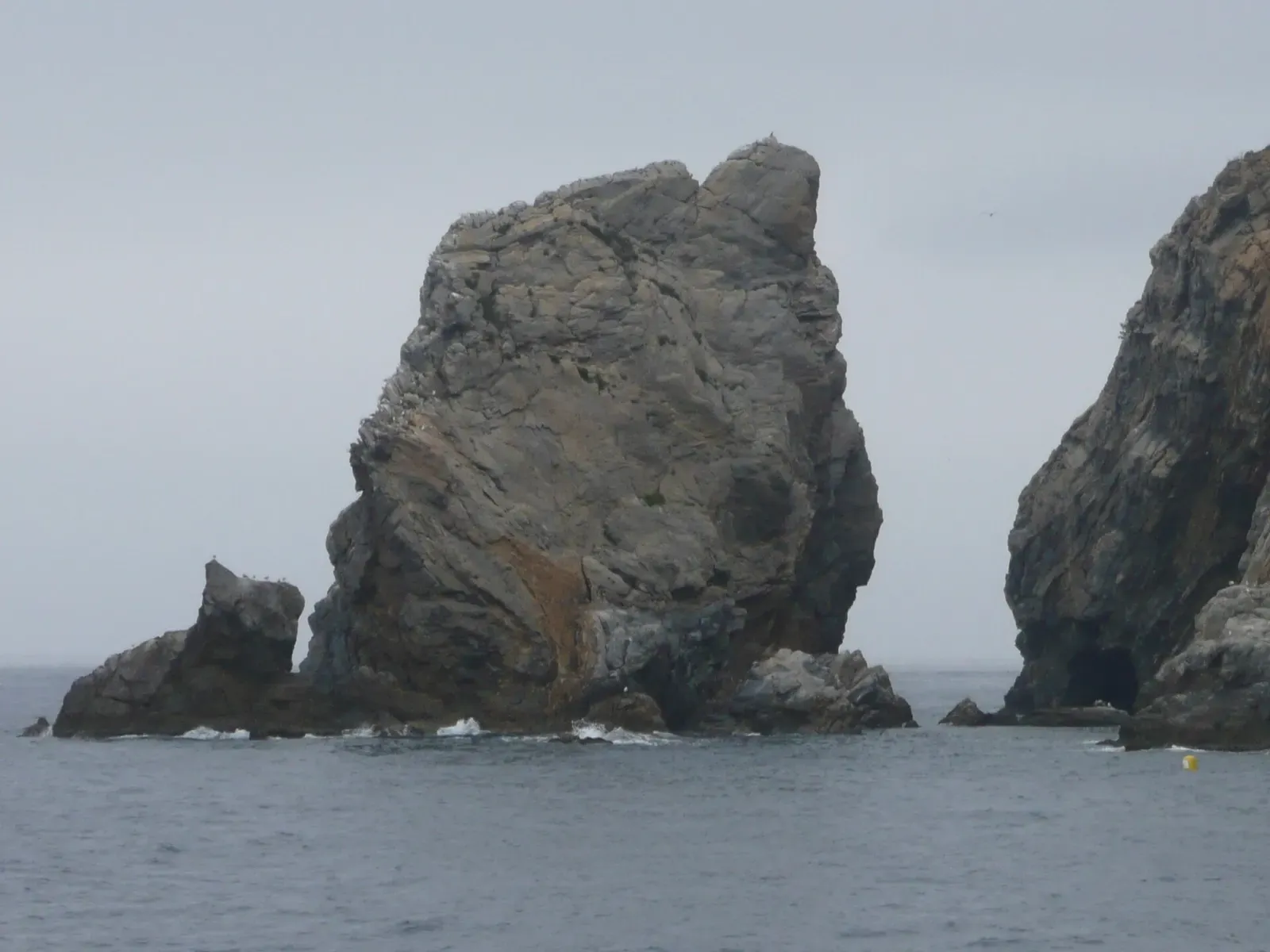 El Gat rock towers at Cap Norfeu, split by a narrow channel on the east side of the cape — Cap de Norfeu, Cap de Creus