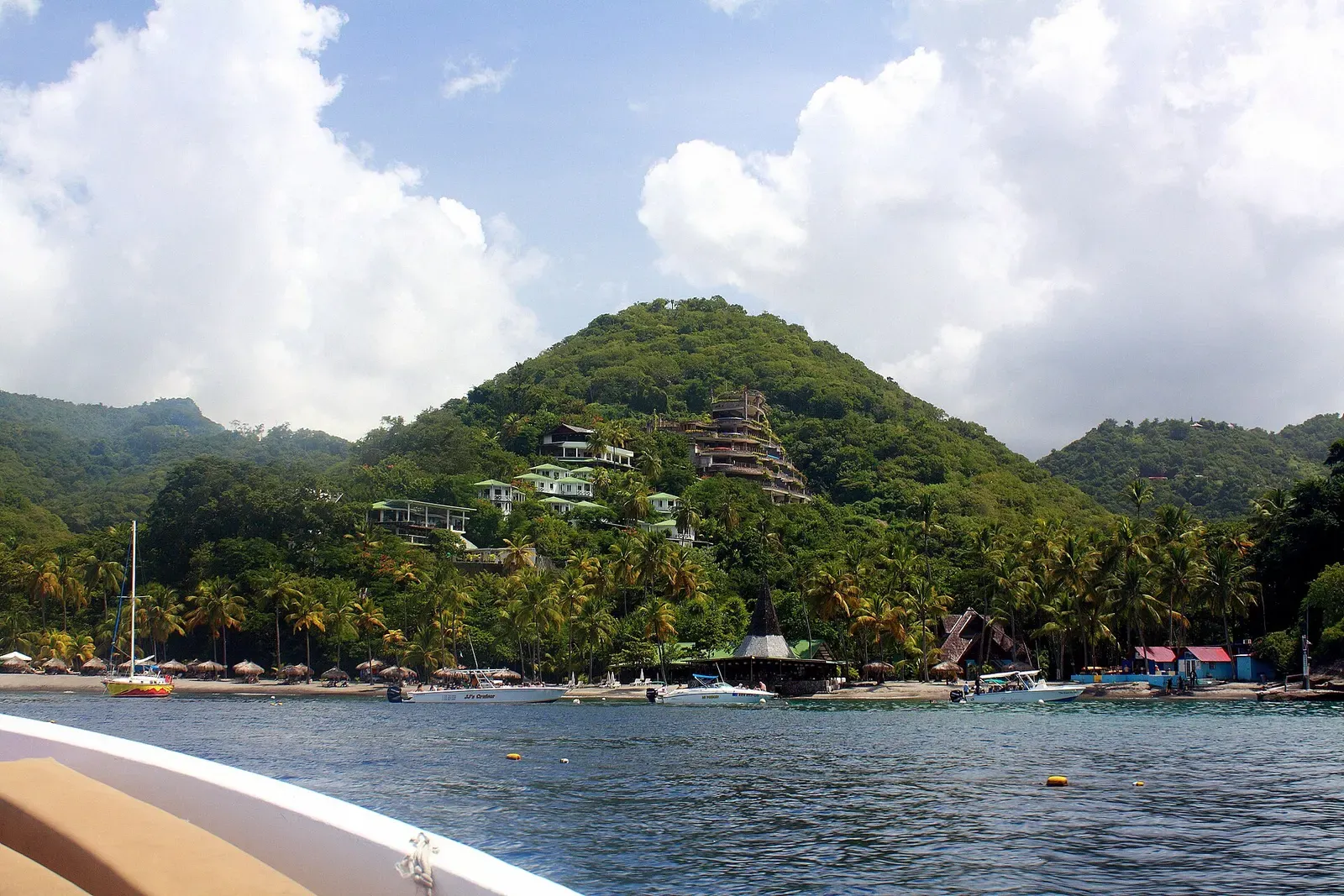 Jade Mountain Resort's terraced hillside buildings above Anse Chastanet Beach — Anse Chastanet Reef, St. Lucia.