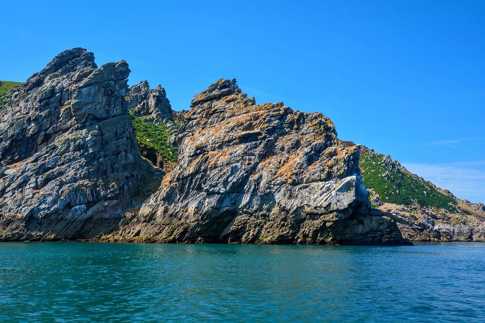 Close view of the weathered rock formation at Gannets Rock, Lundy, seen from the water — Lundy Island