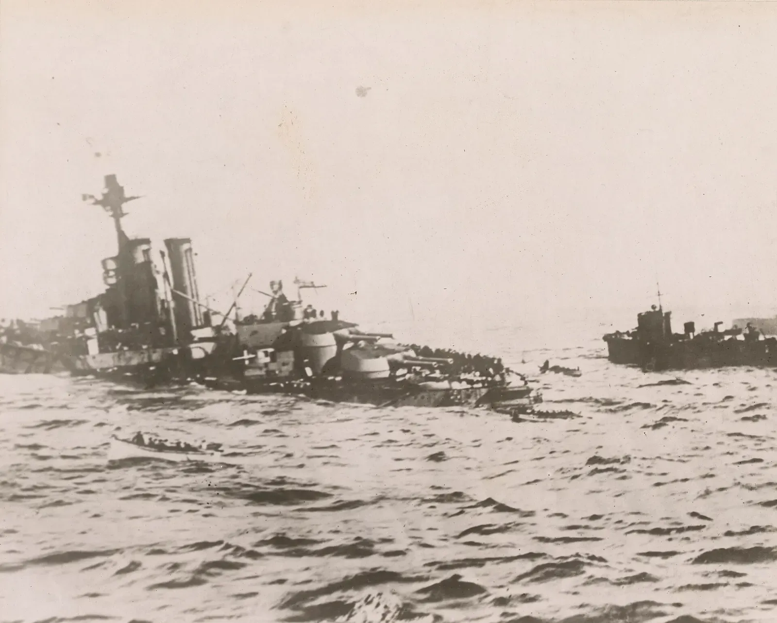 Audacious low in the water and down by the stern, photographed from the deck of the liner RMS Olympic — HMS Audacious, Malin Head.