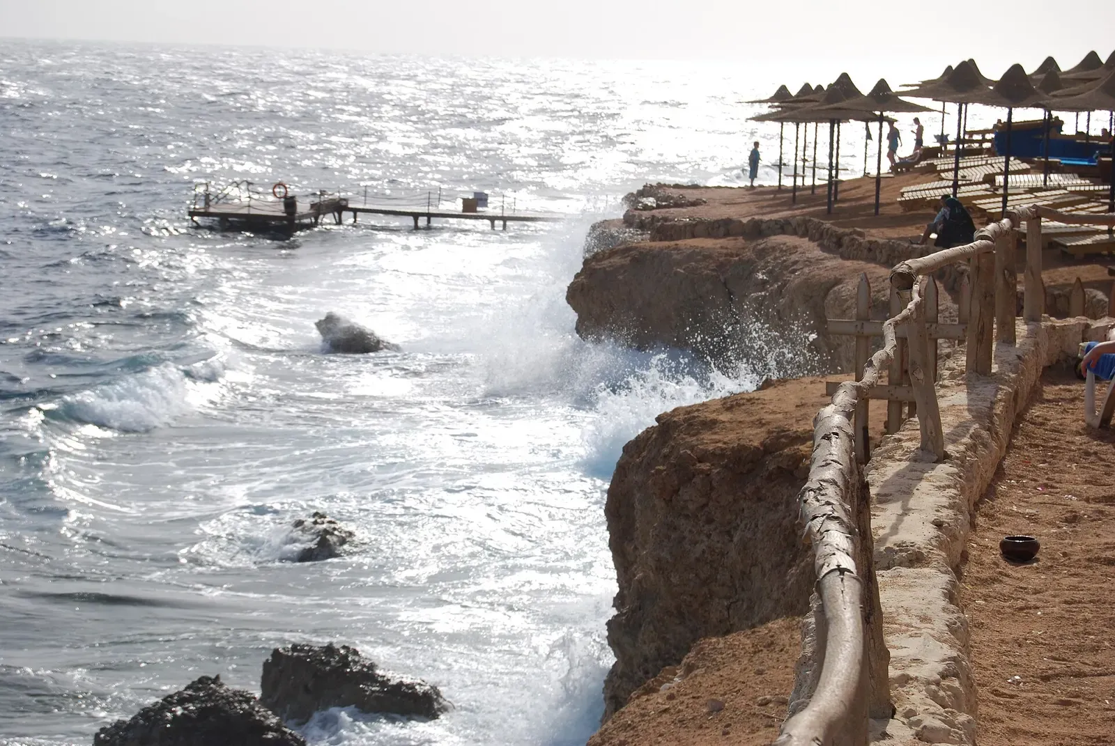 Waves breaking over the rocky reef point at Ras Umm Sid — Sharm El Sheikh.