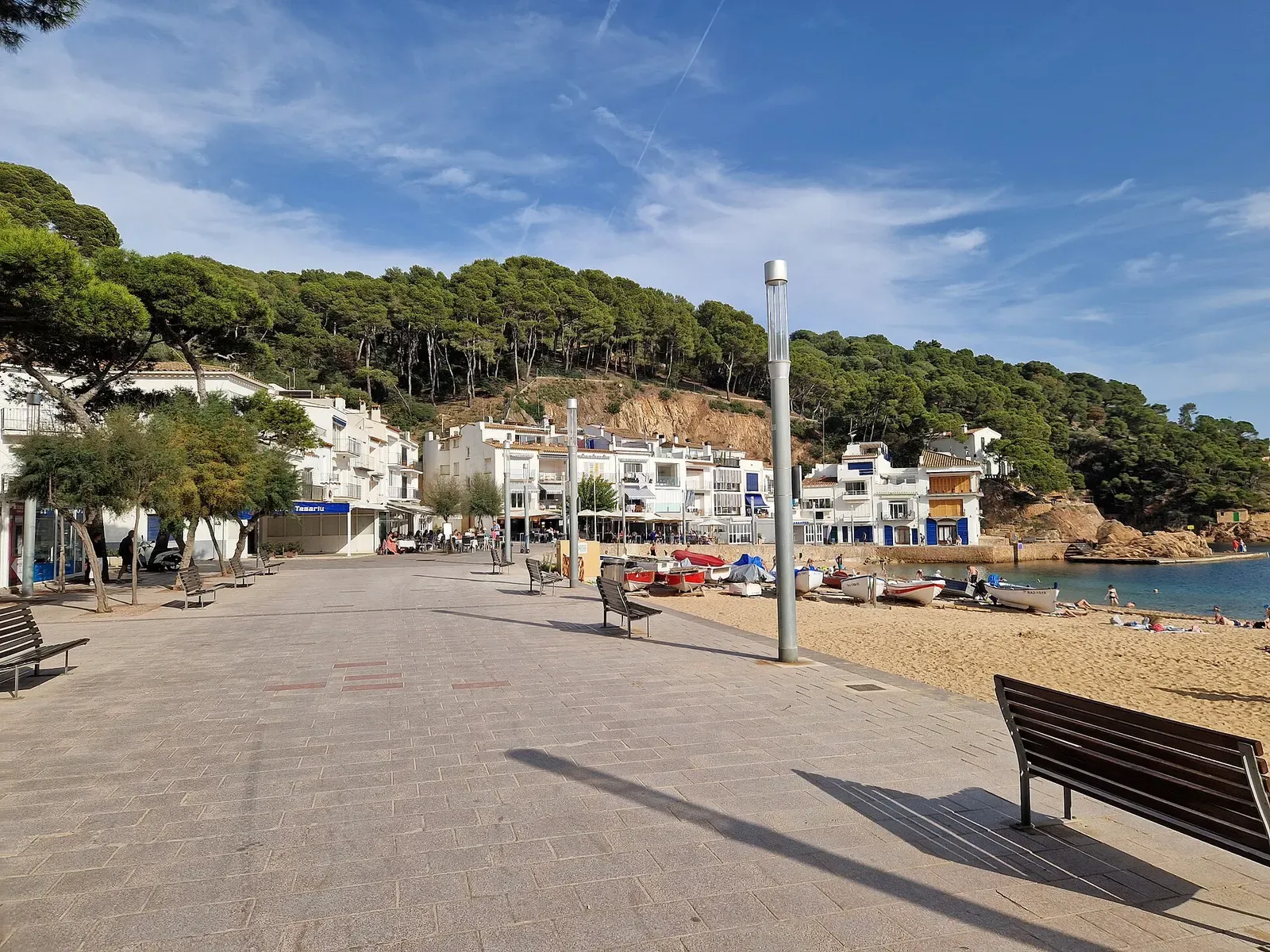 The seafront promenade and harbour at Tamariu