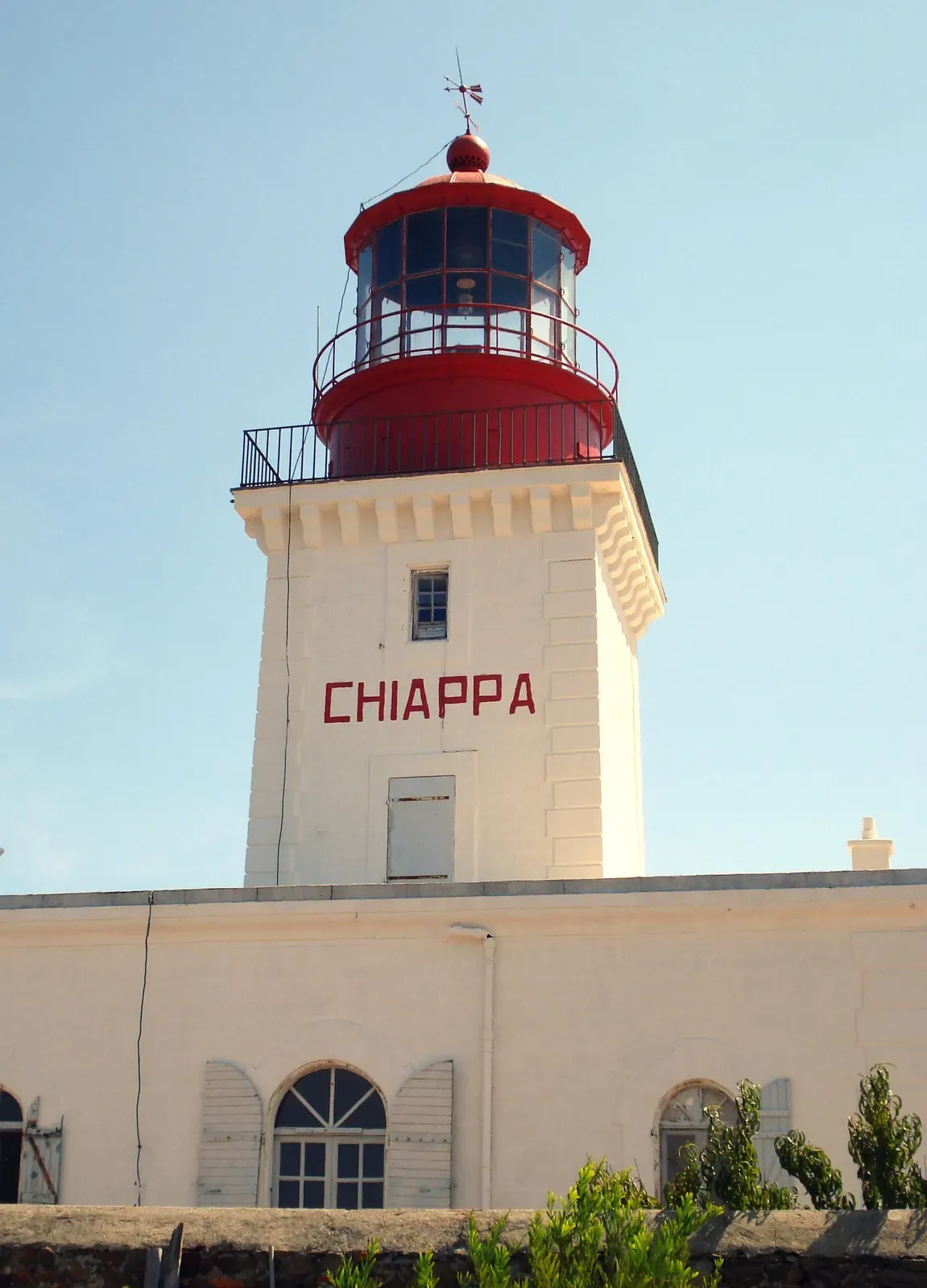 The white lighthouse tower named CHIAPPA standing on the point above the dive site — La Pointe de la Chiappa, Bonifacio, Corsica