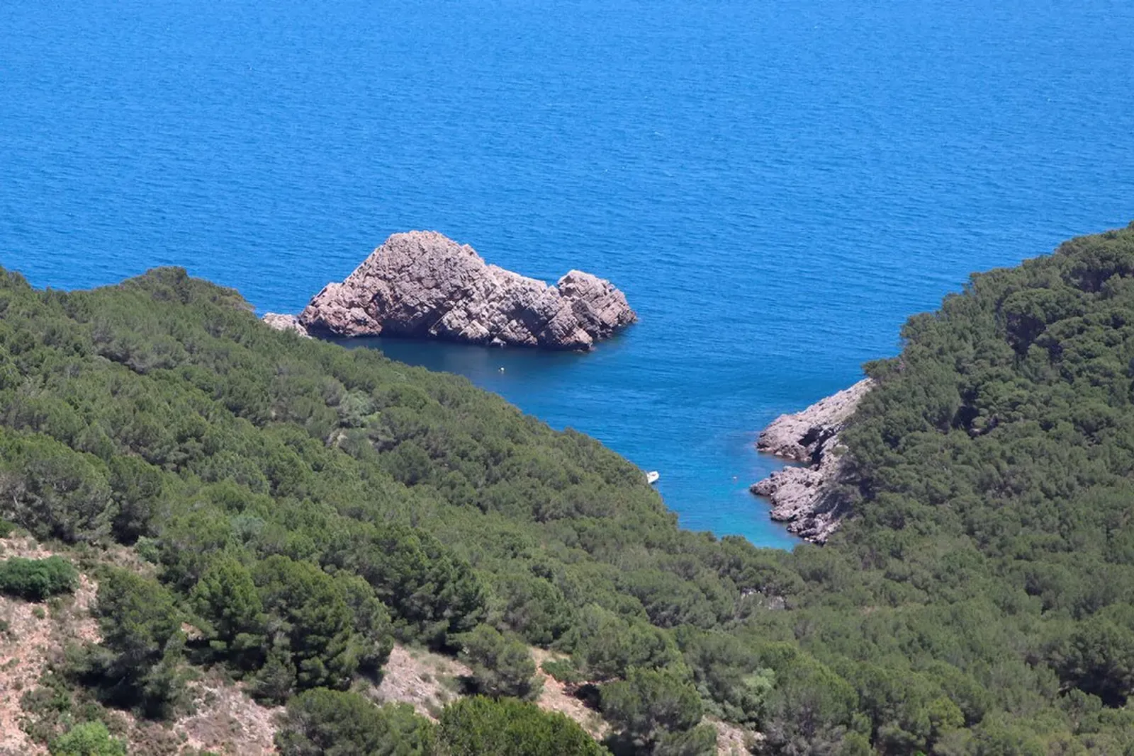 A rocky islet off Cala Ferriol, seen from the cliffs above