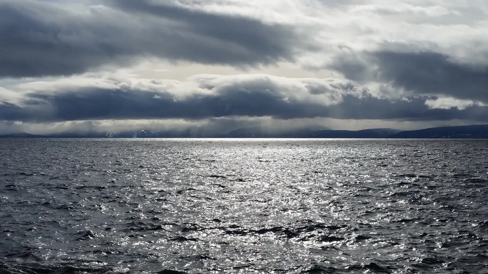 Low storm cloud lying across the surface of Lake Tahoe