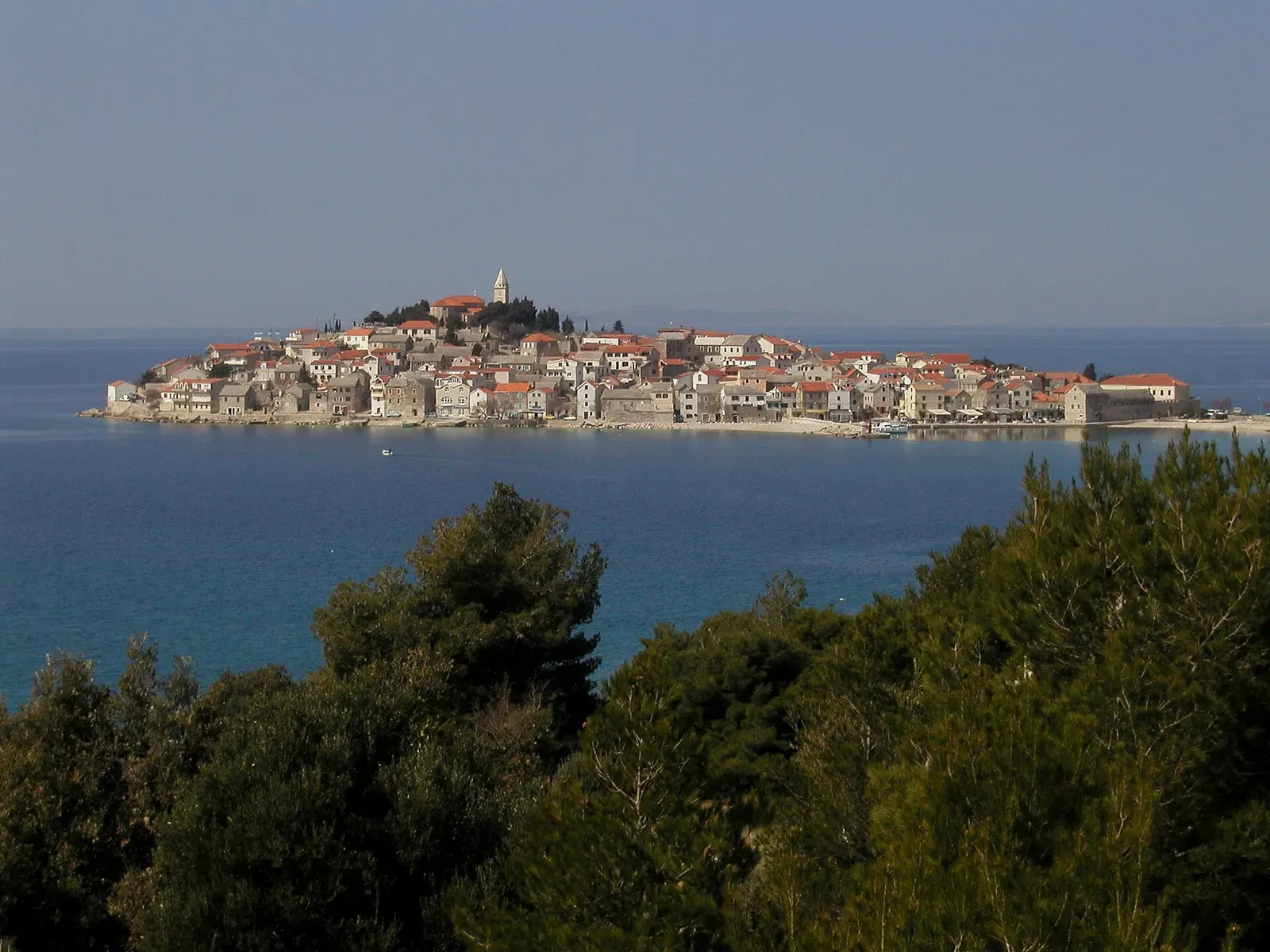 The old town of Primošten on its peninsula, seen across the bay.