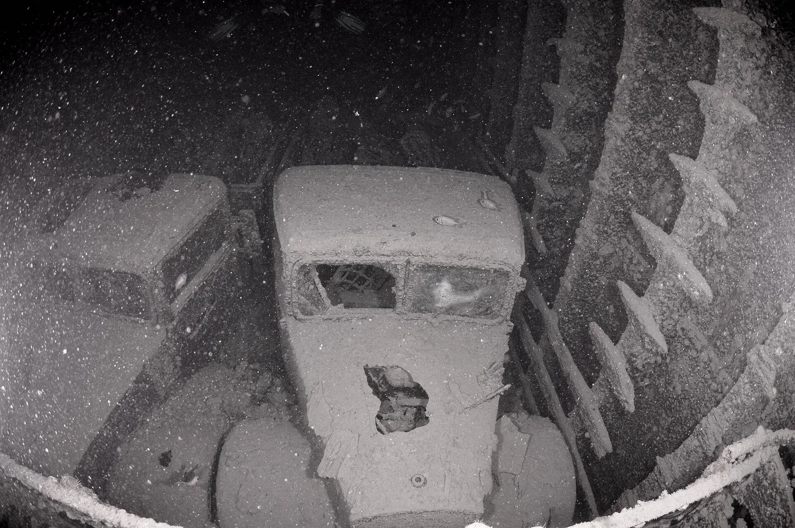 Bedford trucks stacked in a cargo hold of the SS Thistlegorm